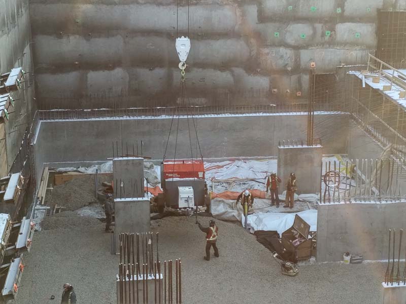 heater being lowered into coustruction site close up